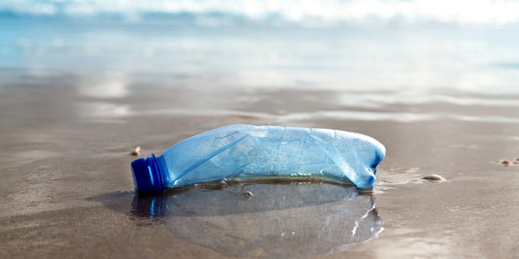 plastic water bottle on beach